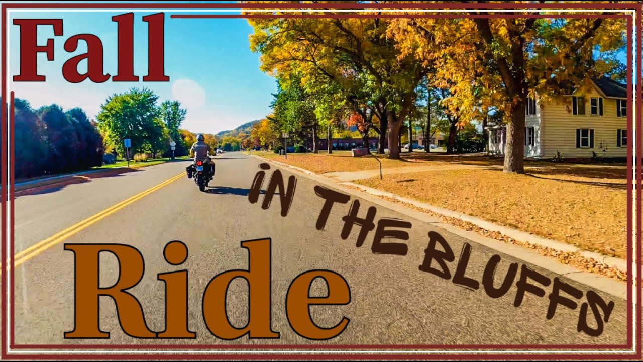 Hero image showing a group of motorcycles riding scenic river bluff roads in Minnesota late summer or fall