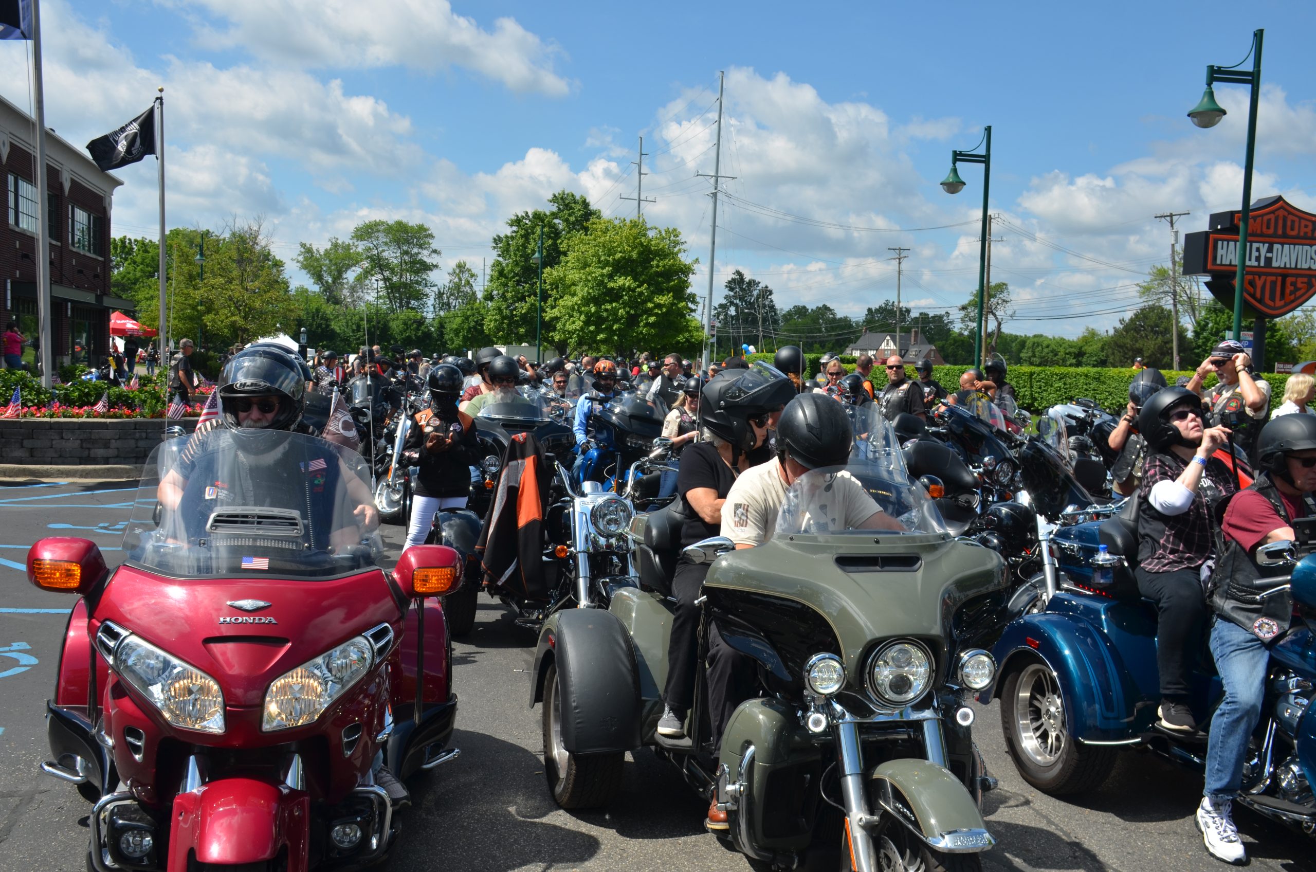 Image of motorcycles lined up at a charity poker run staging area