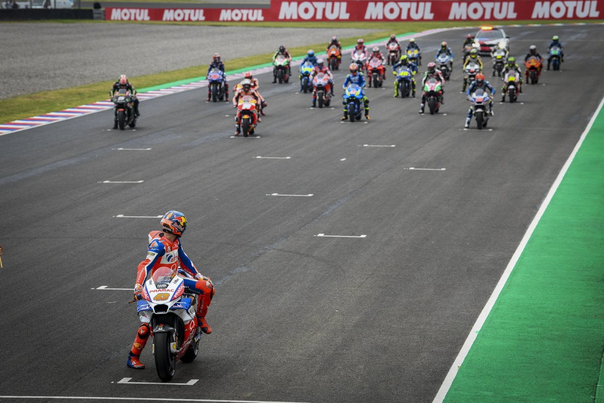 Tire strategy and pit lane action to illustrate mid-race drama section