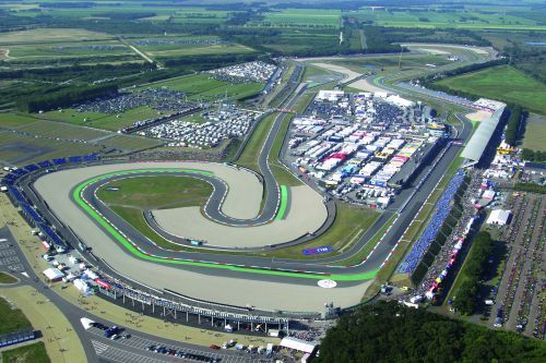 Hero image: MotoGP bikes racing at TT Circuit Assen, Dutch TT