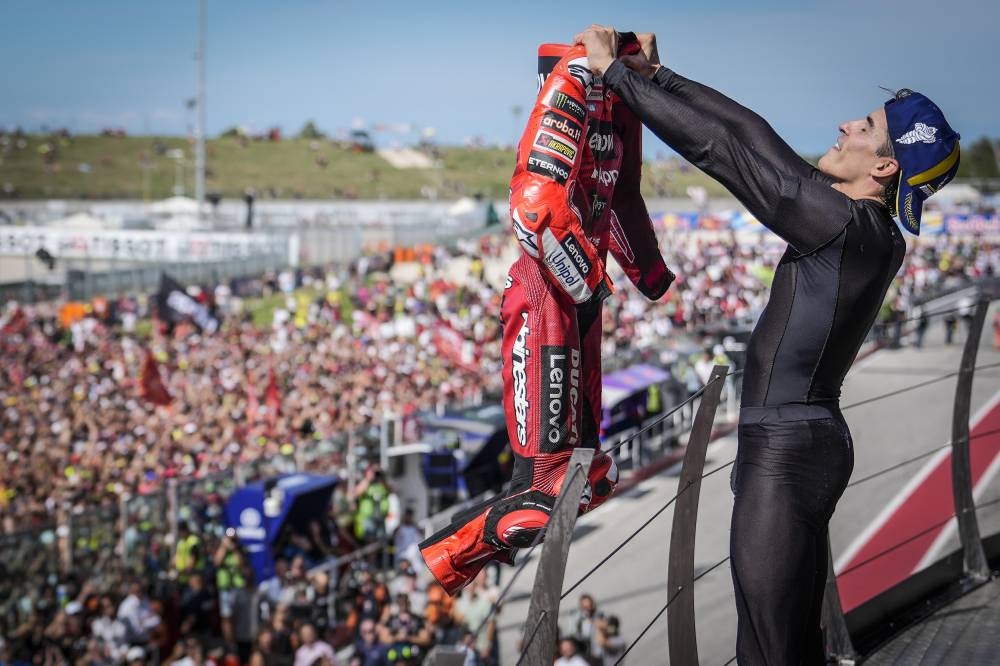 Ducati MotoGP victory celebration on podium