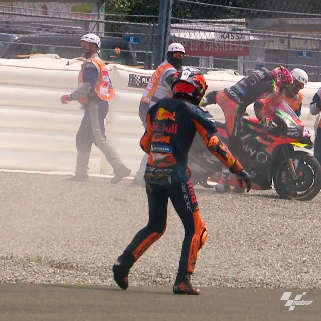 MotoGP rider crashing or sliding into gravel trap during race