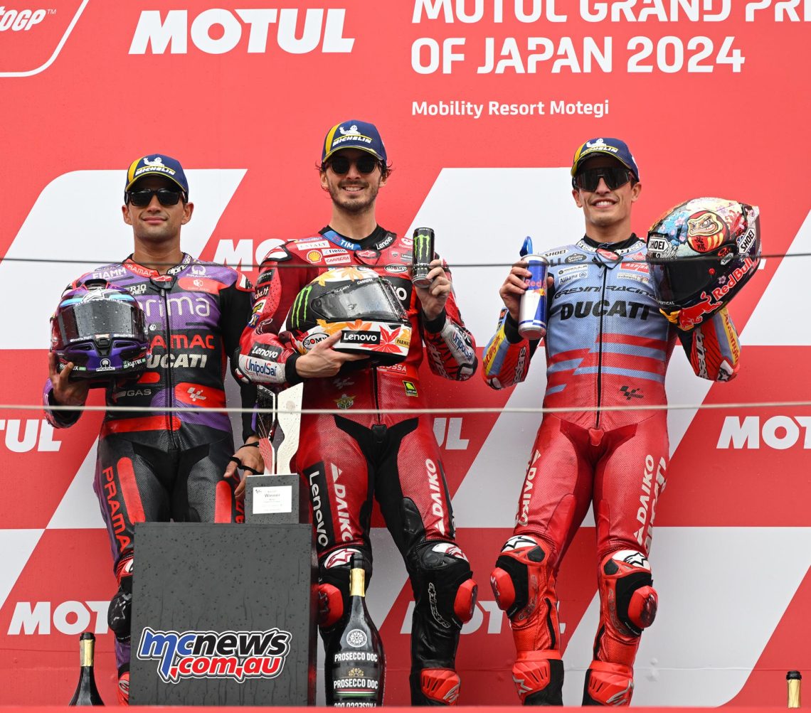 Riders or officials at a MotoGP press conference or announcement event