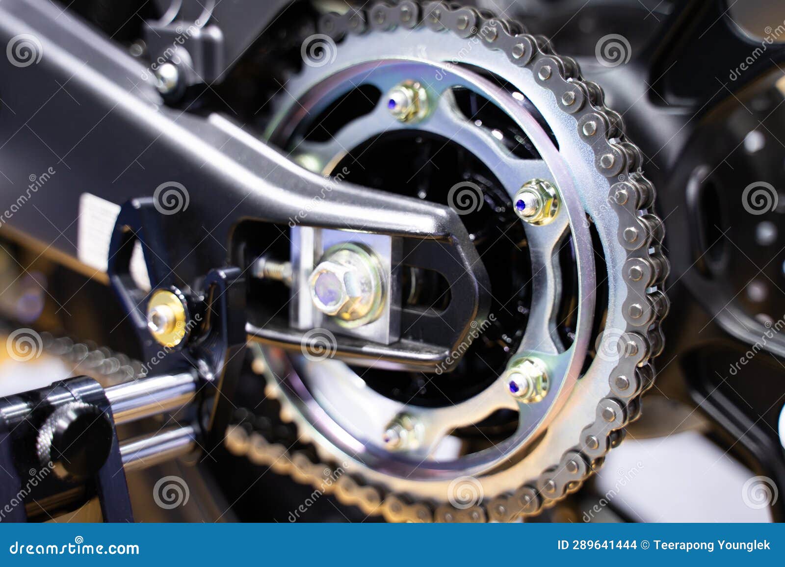 Hero image showing chain drive system on a motorcycle