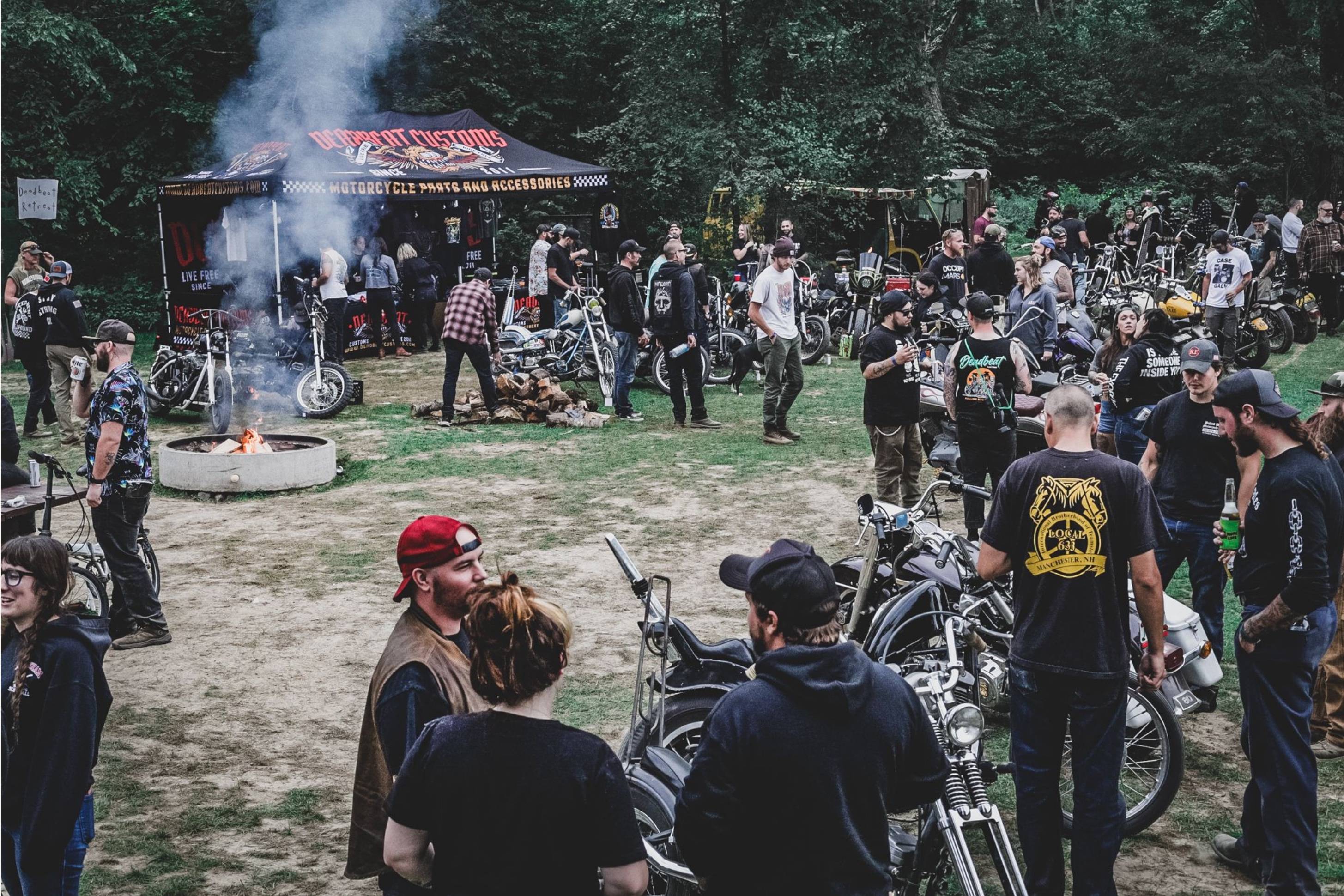 Post-ride festivities with live music and riders gathered at outdoor event