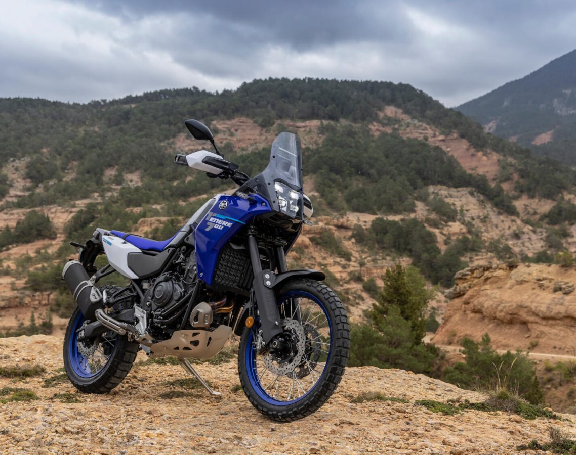 Rider preparing gear before a test ride, supporting the reservation tips section