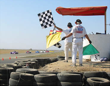 Corner worker with flag at a motorcycle track day event