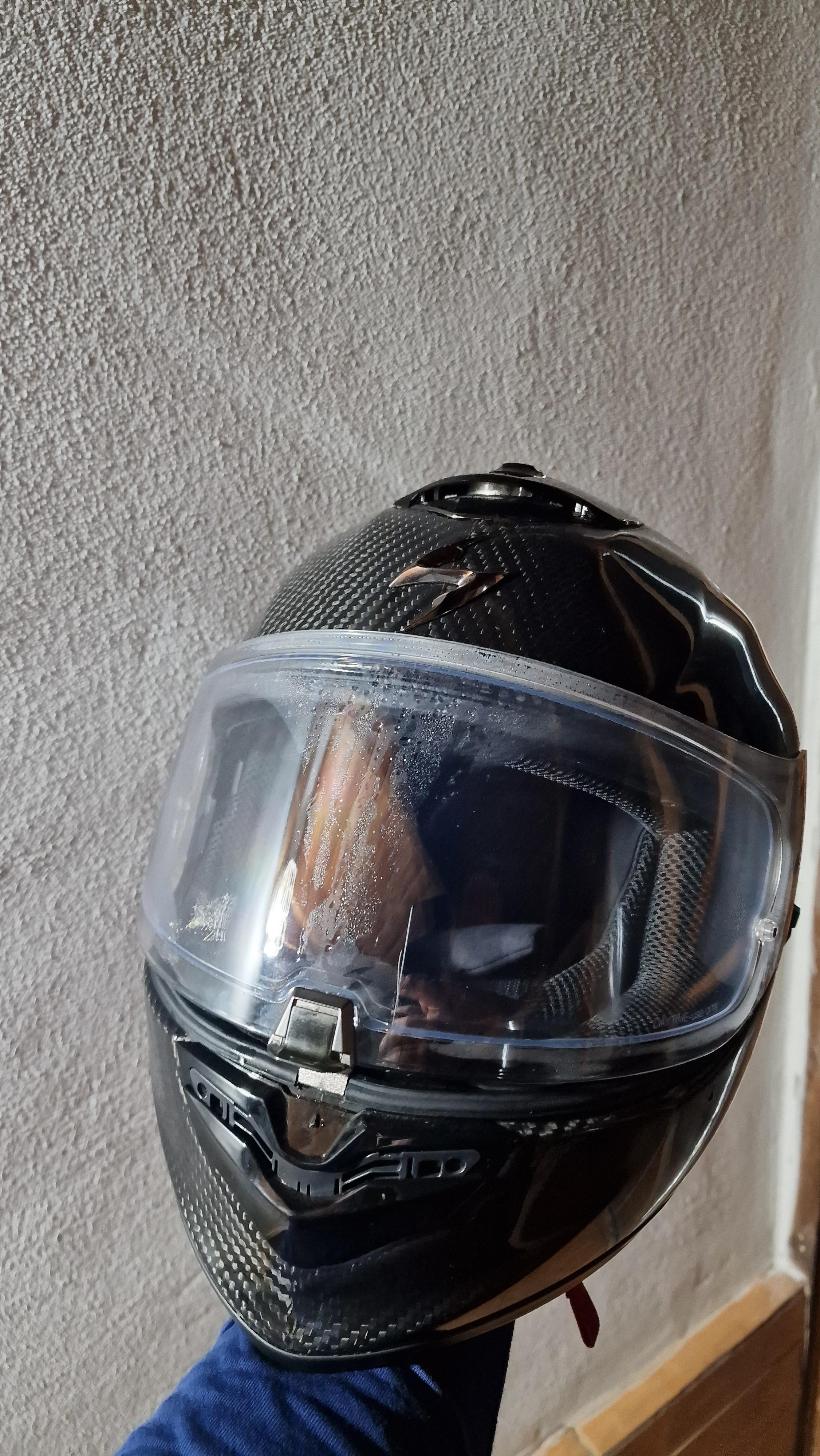 Close-up detail of a premium helmet visor system or Pinlock insert