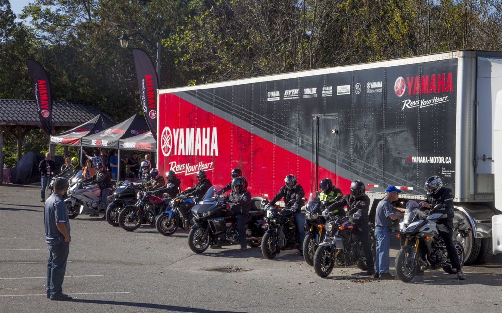 Custom bike show judging at Sturgis with crowd of attendees