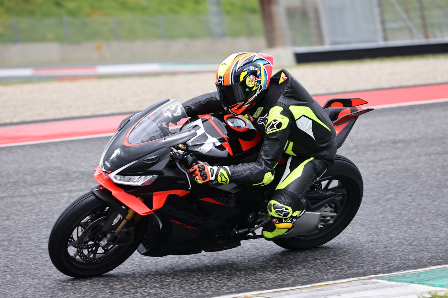 Aprilia RSV4 carving through a corner demonstrating its V4 performance credentials