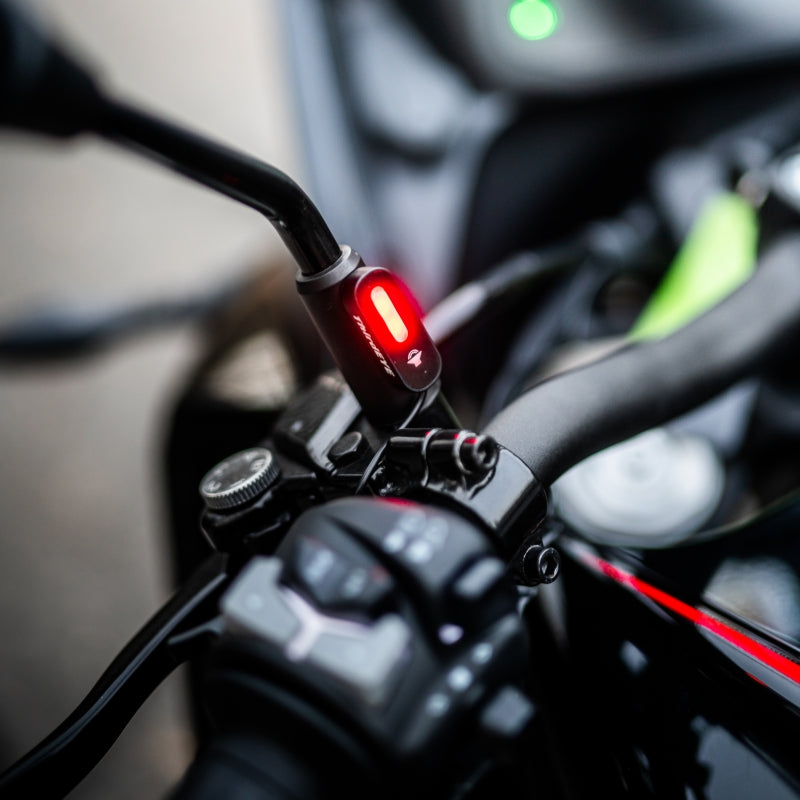 Close-up of motorcycle radar or sensor hardware for the AI safety systems section