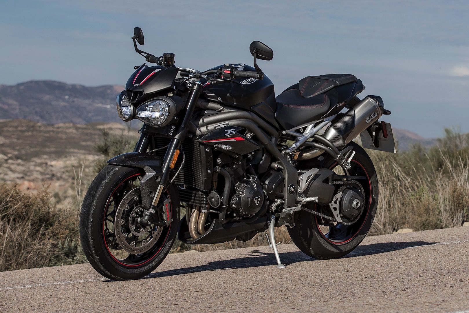 Action shot of Triumph Tiger adventure bike to illustrate potential electrified model