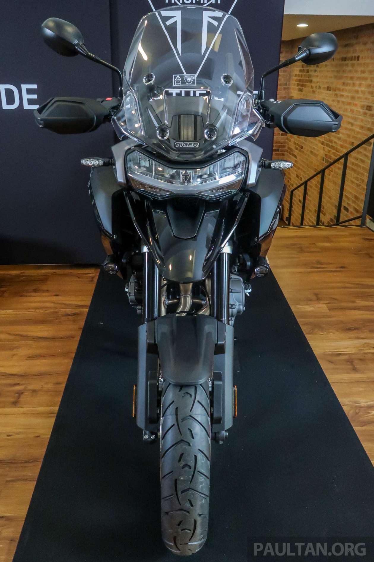 Action shot of rider on Tiger 1200 GT Pro on open road