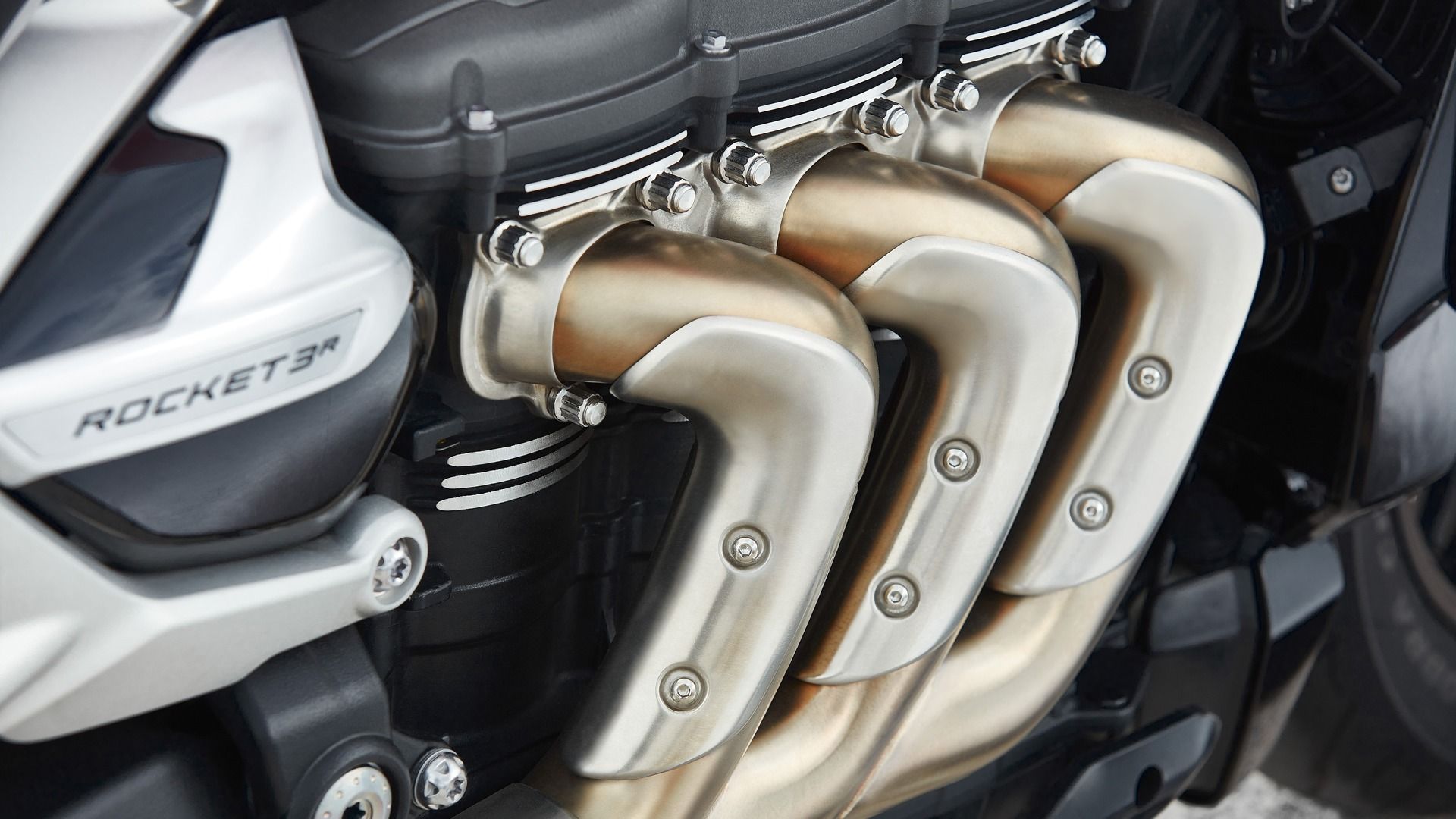 Close-up of the 1160cc triple-cylinder engine for the engine section