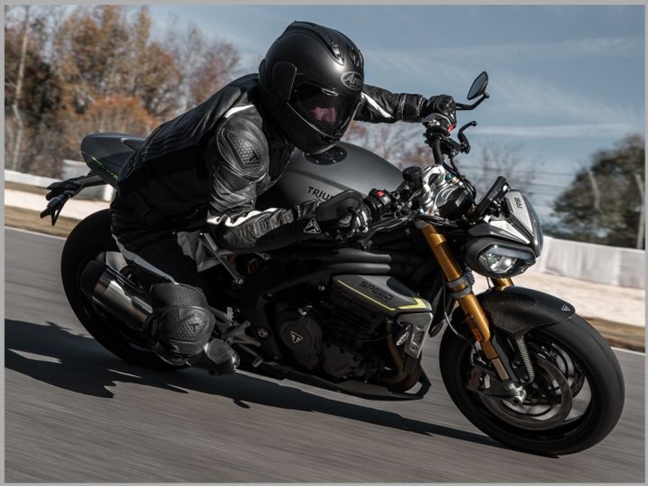 Action shot of the Speed Triple cornering for the chassis section