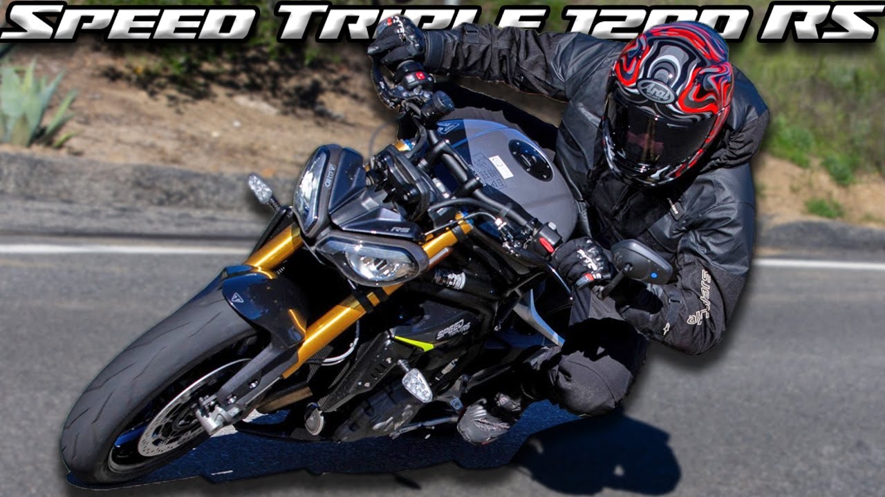 Dynamic riding shot of Speed Triple 1200 RS on road