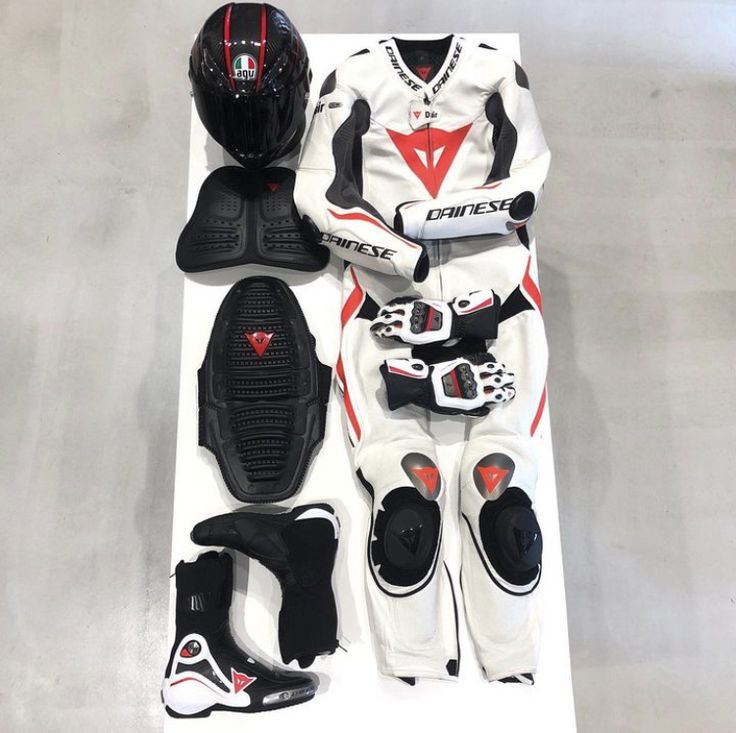 Gear laid out showing the full kit — helmet, jacket, gloves, pants, boots