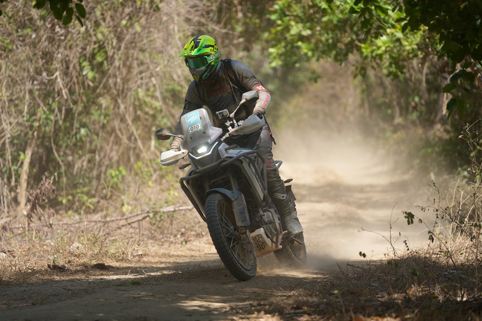 450MT being ridden on a dirt trail for the chassis section